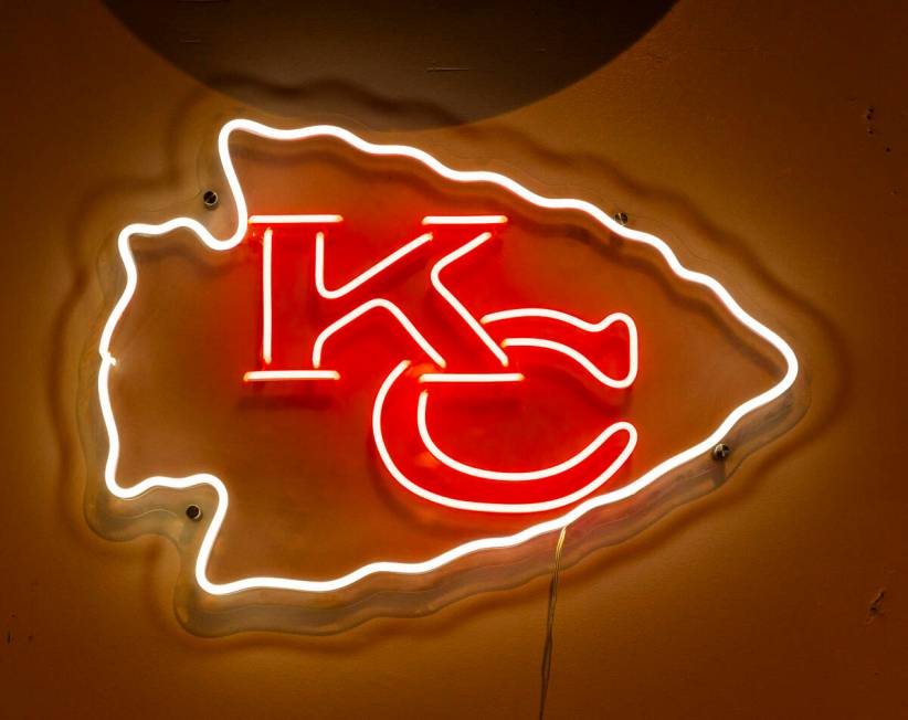 A lighted sign in the Jackpot Bar, a Kansas City Chiefs bar which features members of the KC CH ...