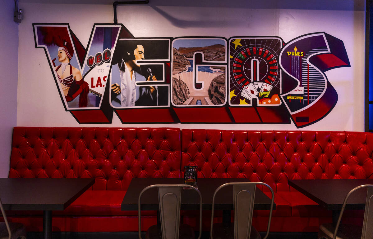 Coll mural on the wall in the Jackpot Bar, a Kansas City Chiefs bar which features members of t ...