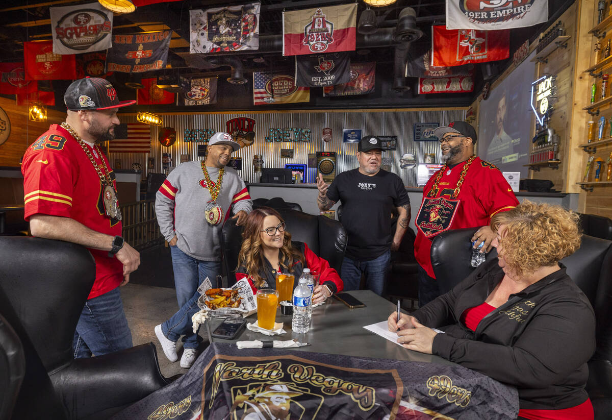 Members of the North Vegas Faithfuls, a San Francisco 49ers club, gather to plan their Super Bo ...
