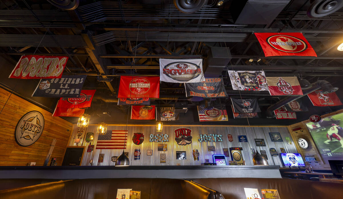 Lots of San Francisco 49ers club banners hang from the rafters at Joey's Tavern where they are ...