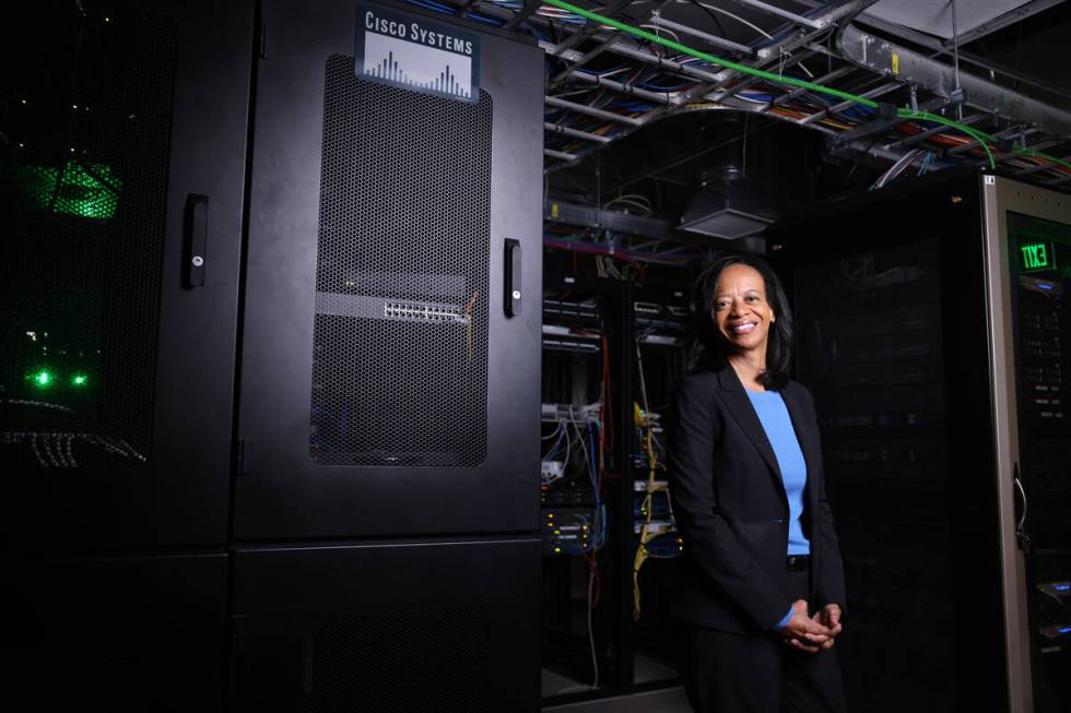 Janet Uthman, market vice president at Cox Communications, poses for a photo at Cox offices in ...
