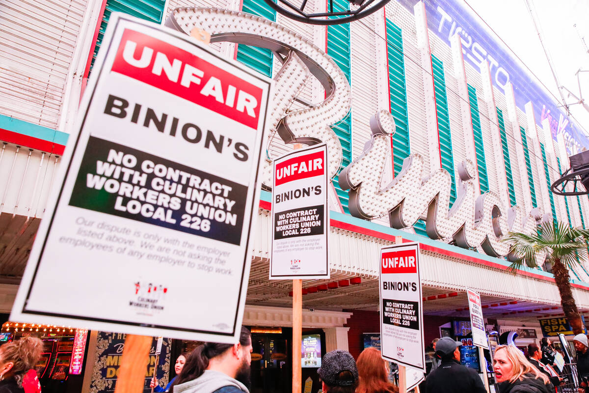 Members of the Culinary Local 226 picket outside Binion’s Gambling Hall & Hotel on Friday, Fe ...