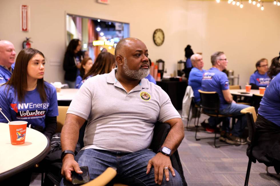 U.S. Attorney Jason Frierson listens during an NV Energy volunteer event on Martin Luther King ...