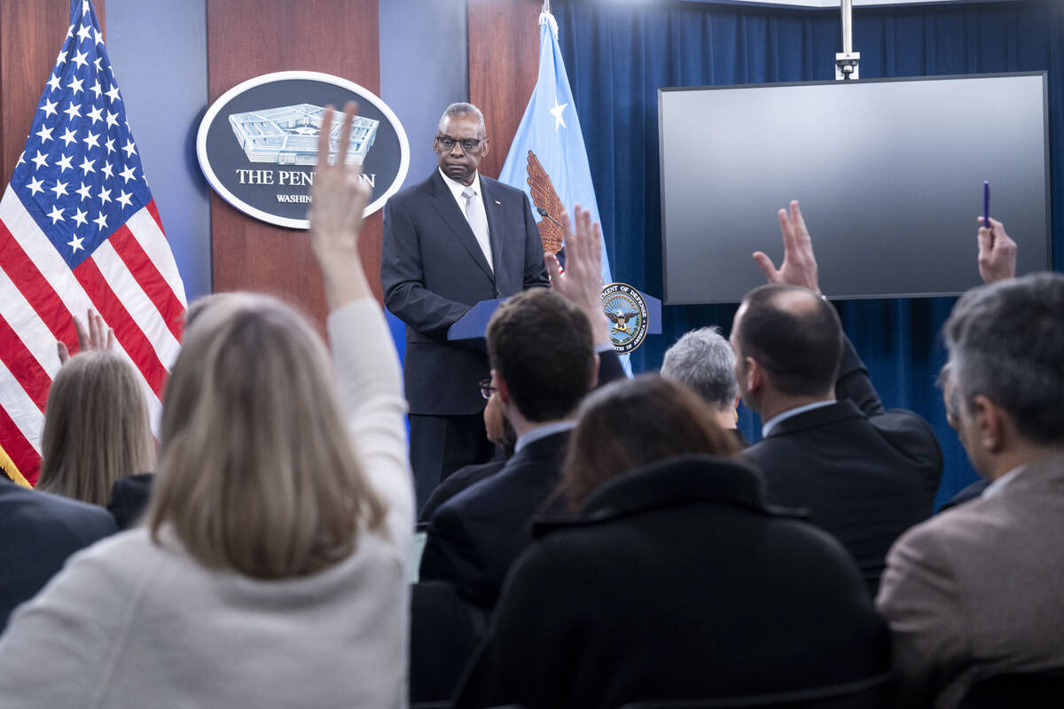 Defense Secretary Lloyd Austin takes question from reporter during a Pentagon press briefing at ...