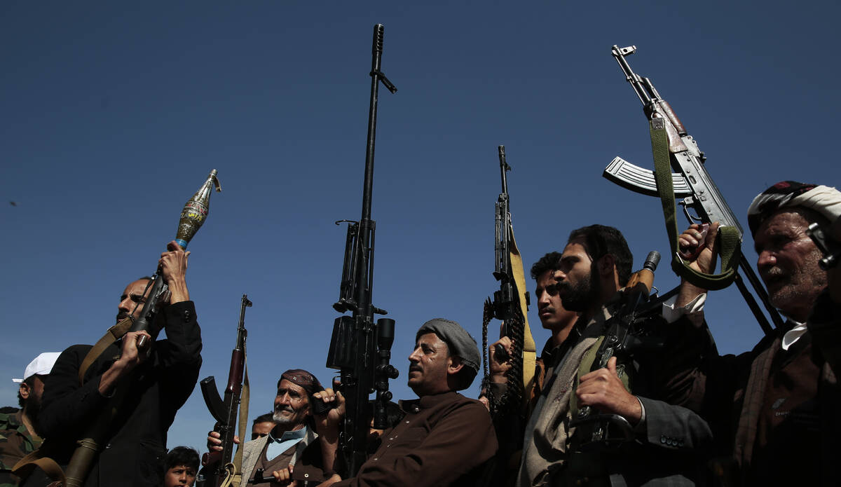 Houthi fighters stage a rally in support of the Palestinians in the Gaza Strip and against the ...