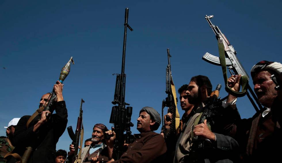 Houthi fighters stage a rally in support of the Palestinians in the Gaza Strip and against the ...