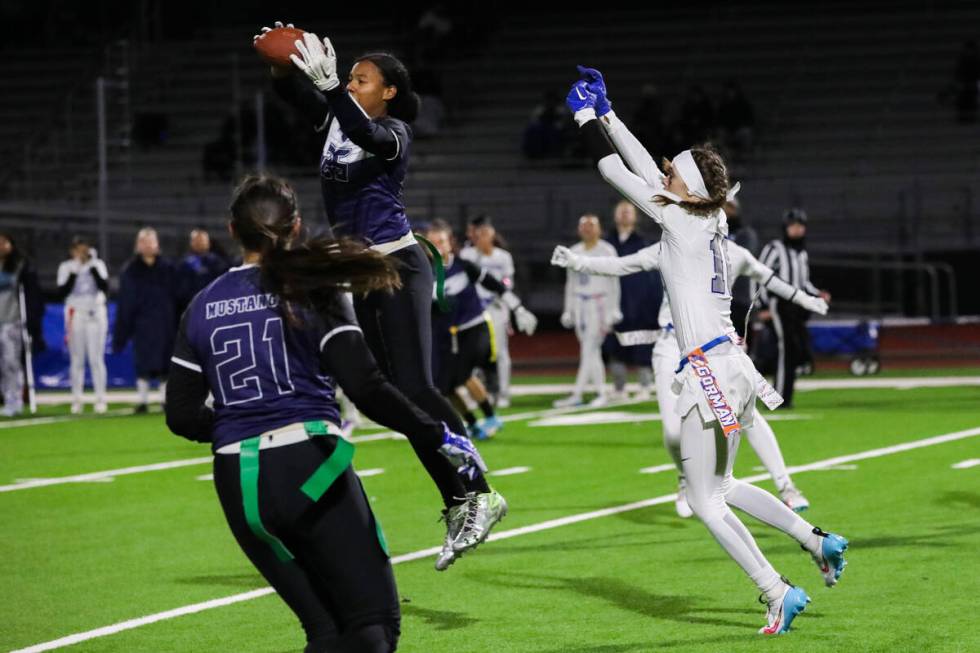 Shadow Ridge’s Jyniah Sanders (25) makes an interception during a flag football game bet ...