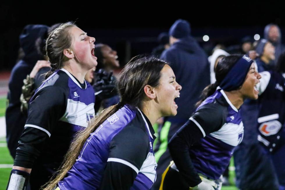 Shadow Ridge students cheer on their teammates during a flag football game between Bishop Gorma ...