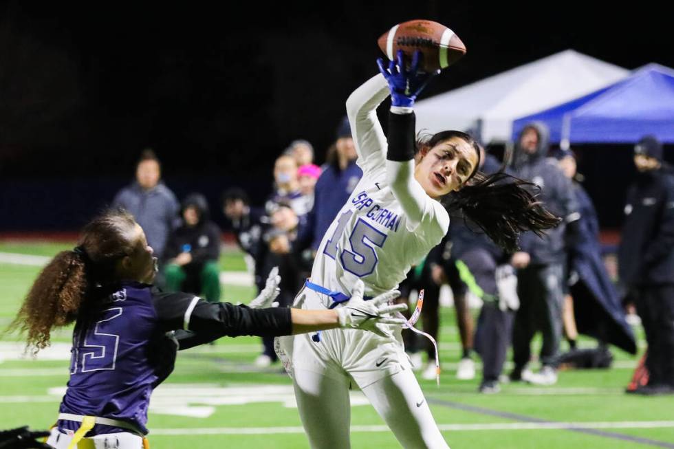 Bishop Gorman’s Alana Moore (15) catches the ball during a flag football game between Bi ...