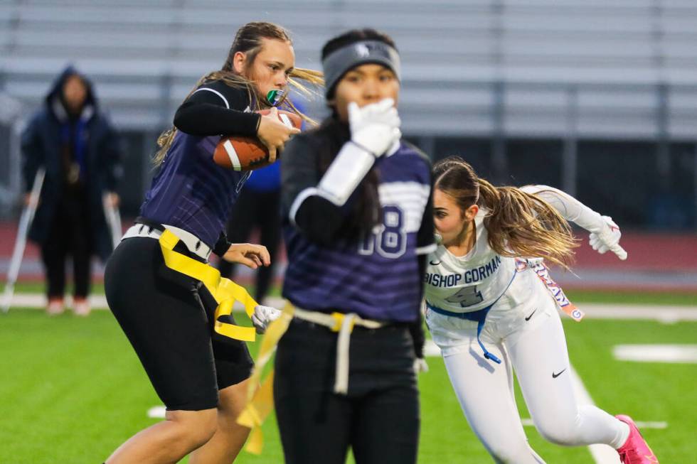 Shadow Ridge’s Chloe Covington (6) looks to dodge Bishop Gorman’s Audrey Swanis ( ...