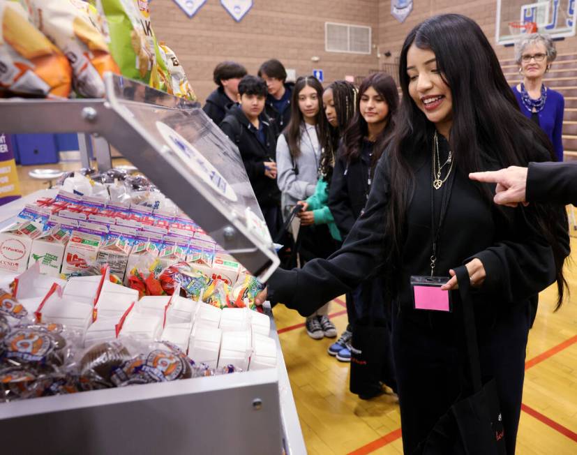 West Preparatory Academy eighth grader Arianna Martinez-Martin, right, picks healthy grab and g ...