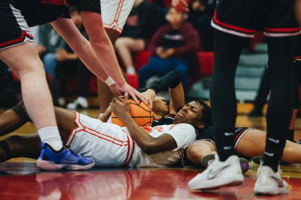 Bishop Gorman small forward Caleb Williams keeps hold of the ball during a game between Bishop ...