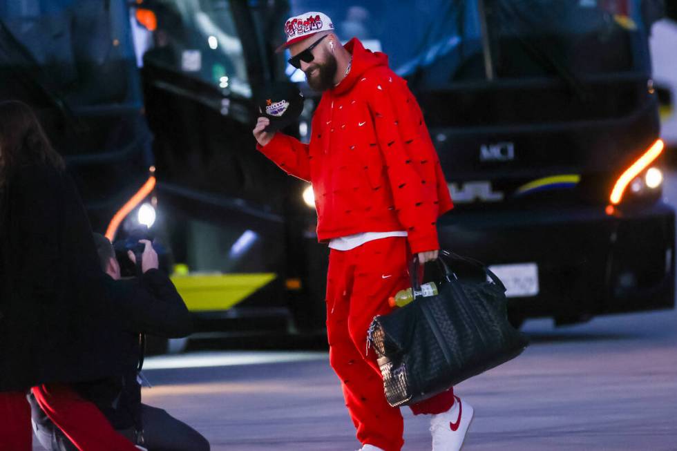 Kansas City Chiefs tight end Travis Kelce arrives at the Harry Reid International Airport along ...