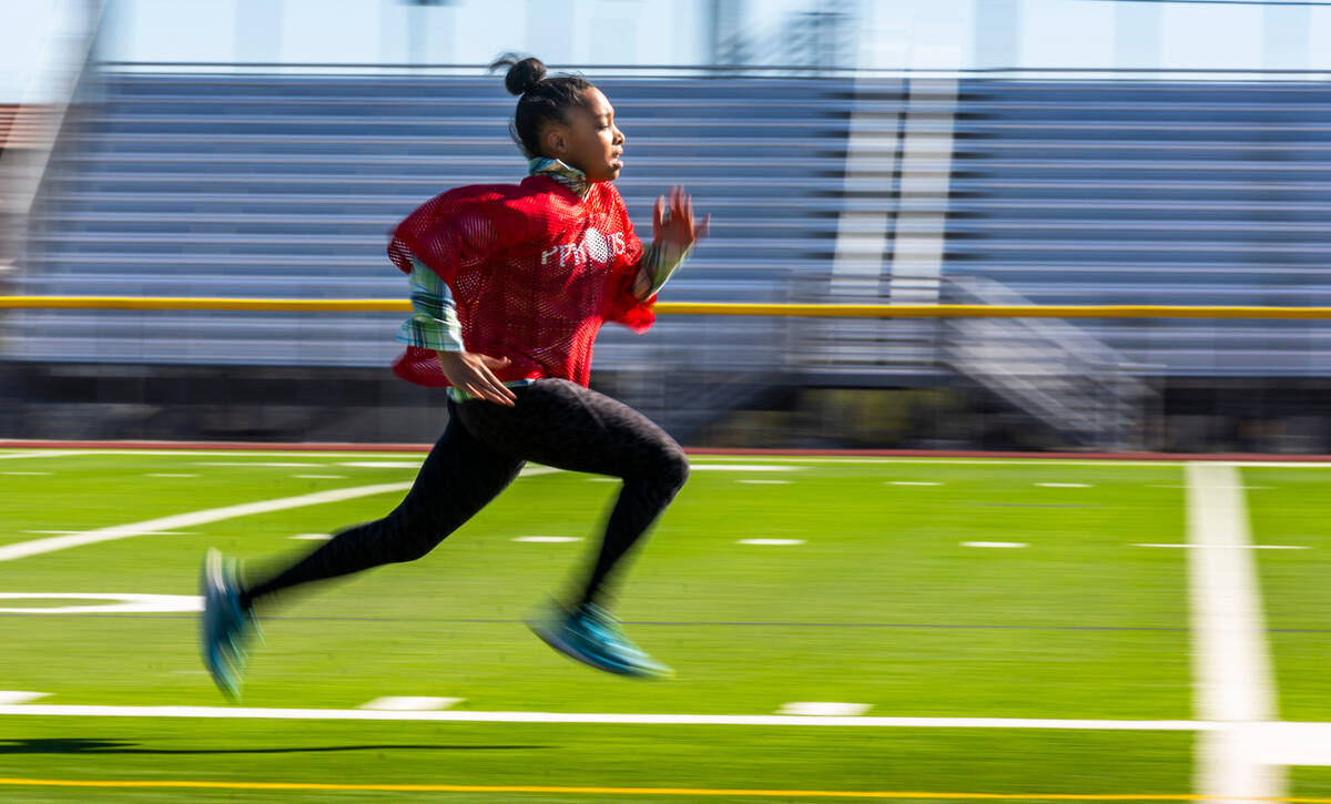 G’Justice Owens of Las Vegas, a 10/11-year-old girl's contestant. runs the 40-yard dash ...