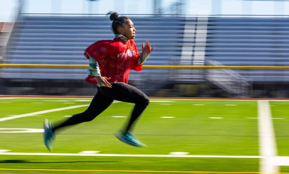 G’Justice Owens of Las Vegas, a 10/11-year-old girl's contestant. runs the 40-yard dash ...