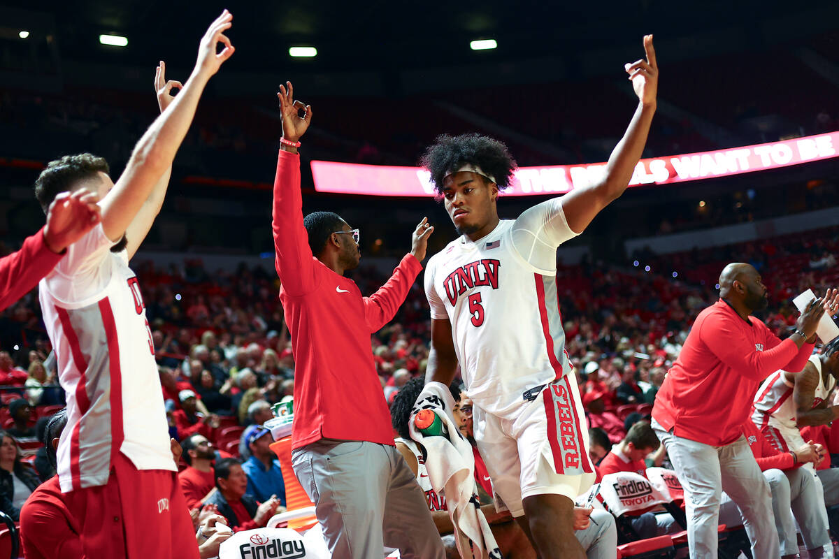UNLV Rebels forward Rob Whaley Jr. (5) and the bench celebrate a three-pointer during the secon ...