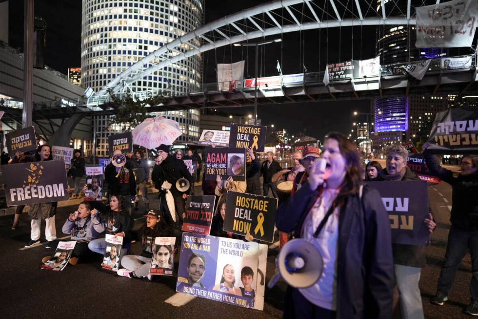 Israelis block a highway as they demand the release of the hostage from Hamas captivity during ...