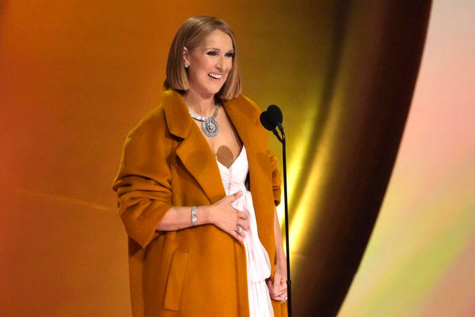 Celine Dion presents the award for album of the year during the 66th annual Grammy Awards on Su ...