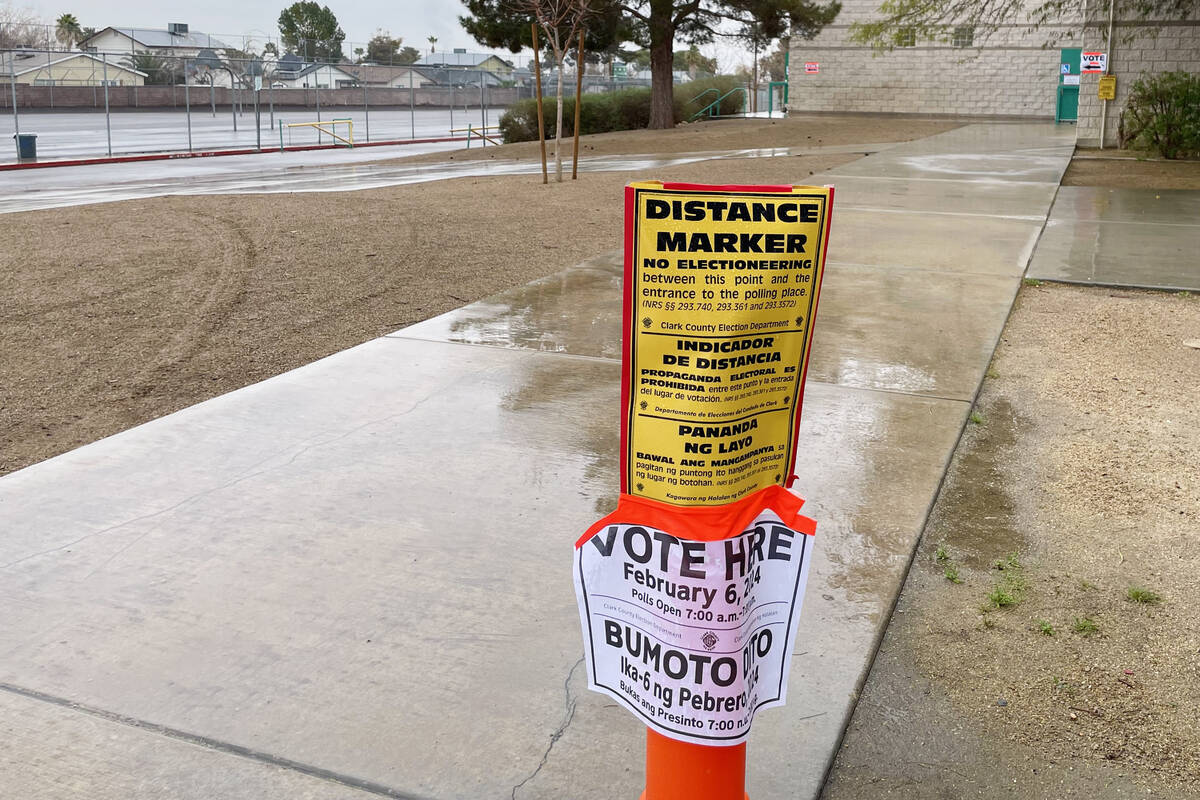 Signs direct primary voters at Green Valley High School Tuesday, February 6, 2024, in Henderson ...