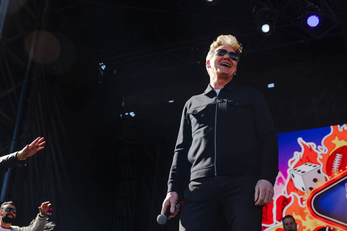 Celebrity chef Gordon Ramsey addresses the crowd at Guy’s Flavortown Tailgate party for Super ...