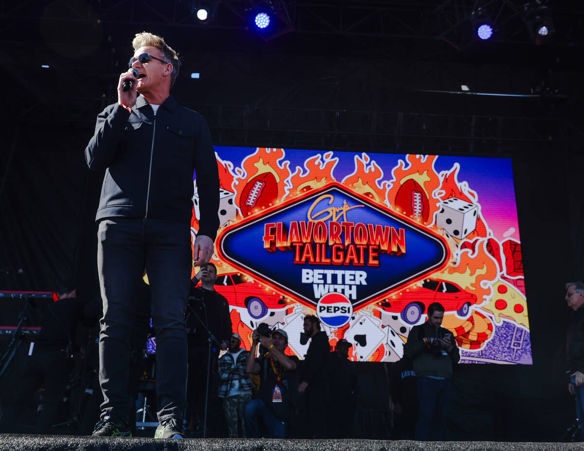 Celebrity chef Gordon Ramsey addresses the crowd at Guy’s Flavortown Tailgate party for ...