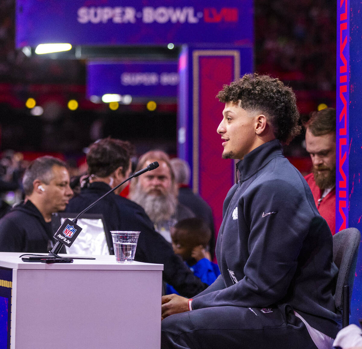 Kansas City Chiefs player Patrick Mahomes listens to a media member's question on the field dur ...