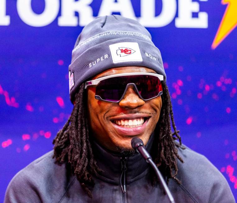 Kansas City Chiefs player Rashee Rice smiles at a media member's question on the field during t ...