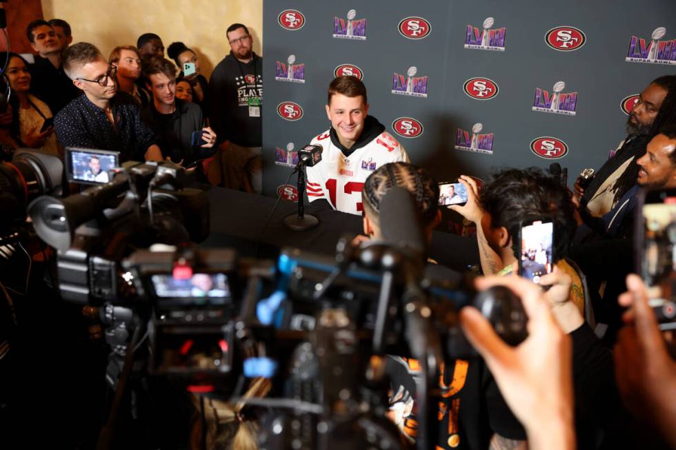 San Francisco 49ers quarterback Brock Purdy talks with the news media at Hilton Lake Las Vegas ...