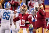 San Francisco 49ers quarterback Brock Purdy (13) and offensive tackle Trent Williams (71) celeb ...