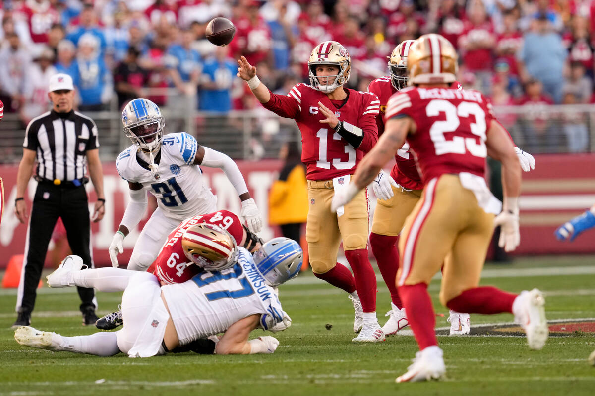 FILE - San Francisco 49ers quarterback Brock Purdy passes against the Detroit Lions during the ...
