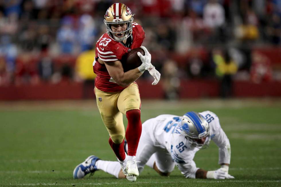 San Francisco 49ers running back Christian McCaffrey (23) runs during the NFC Championship NFL ...