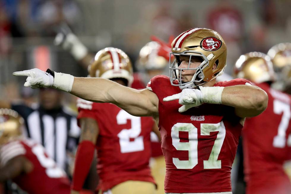 San Francisco 49ers defensive end Nick Bosa (97) reacts after a turnover during the NFC Champio ...