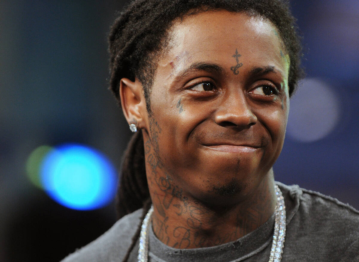 FILE - In this June 10, 2008 file photo, rapper Lil' Wayne makes an appearance on MTV's "T ...
