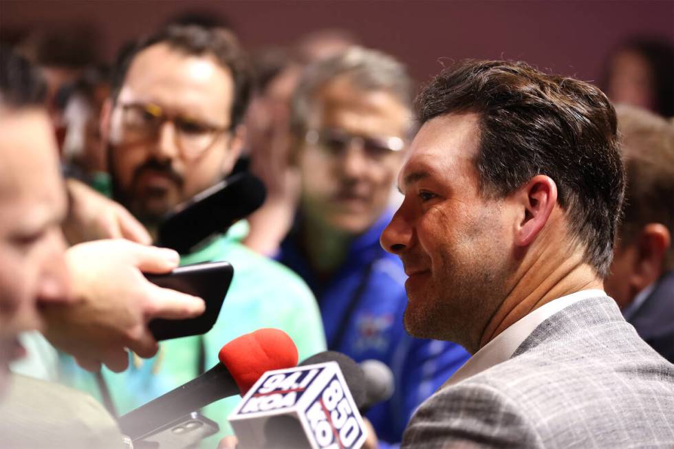 CBS Sports color commentator Tony Romo answers questions during a news conference at Mandalay B ...