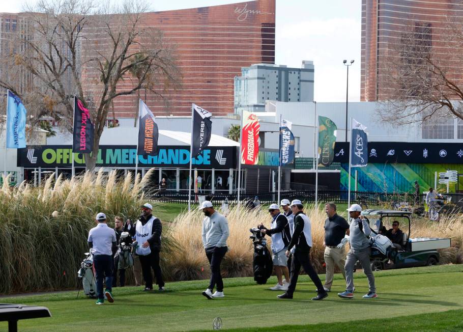 Players, including Jon Rahm, center, prepare to compete in LIV Golf Las Vegas Pro-Am tournament ...