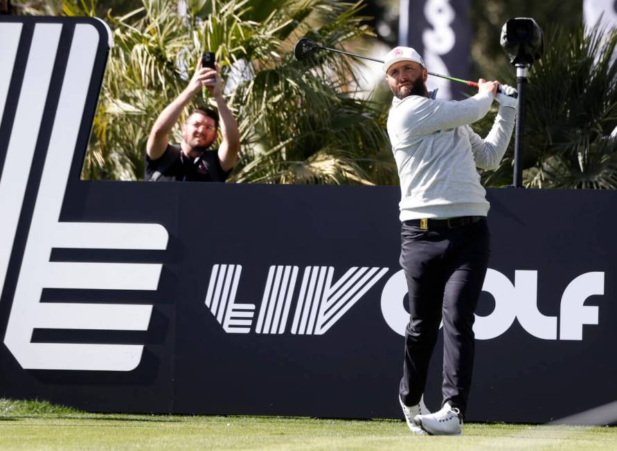 Jon Rahm watches his tee shot during LIV Golf Las Vegas Pro-Am tournament at Las Vegas Country ...