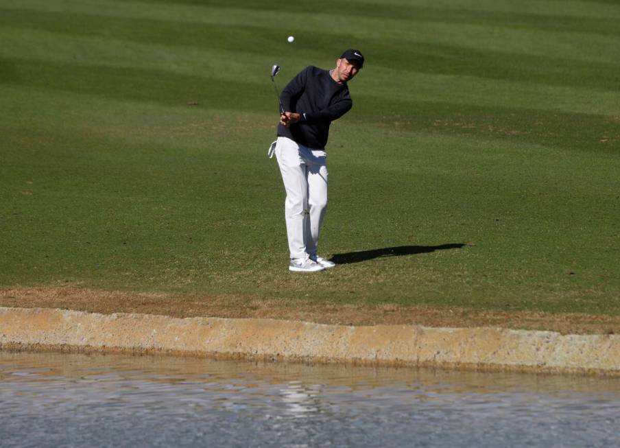 Radek Stepanek watches his shot on the 18th hole during LIV Golf Las Vegas Pro-Am tournament at ...