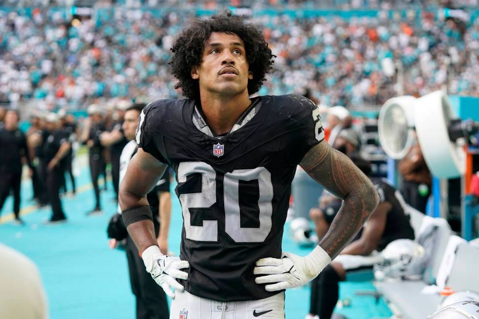 Las Vegas Raiders safety Isaiah Pola-Mao (20) looks up to the scoreboard during the end of the ...