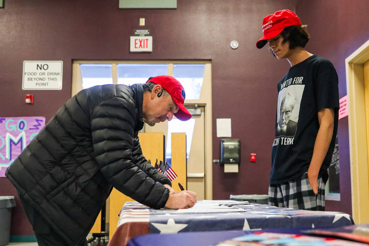 Steven West fills out caucus papers at a caucus center in Summerlin during the Nevada GOP caucu ...
