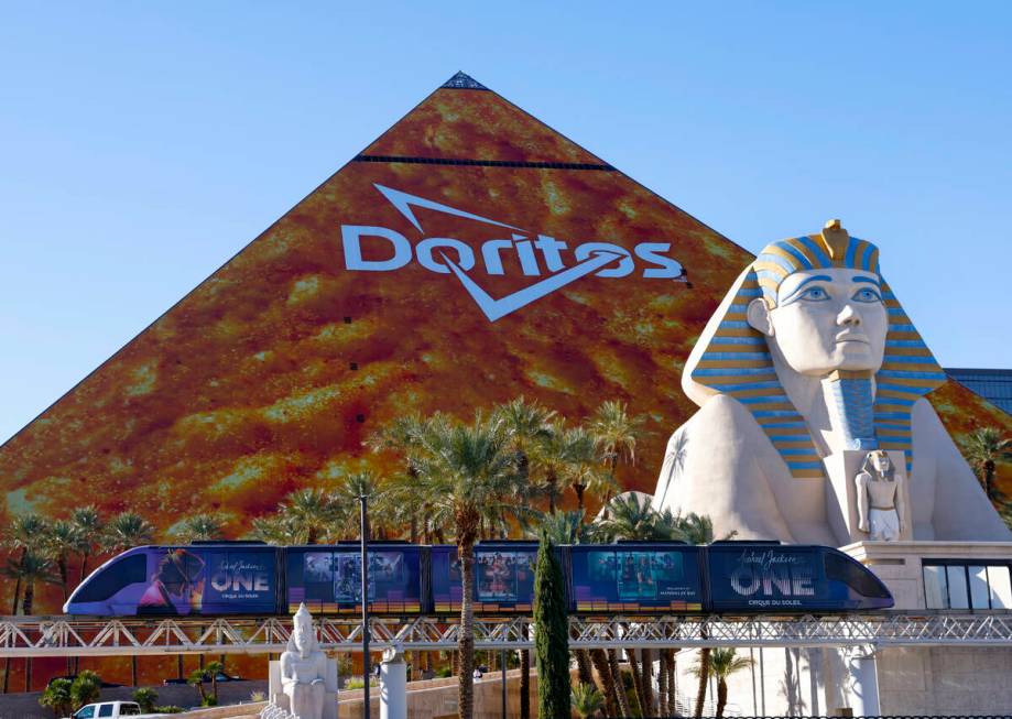 The Doritos ad wraps the east side of the Luxor, on Thursday, Jan. 4, 2024, in Las Vegas. (Bizu ...