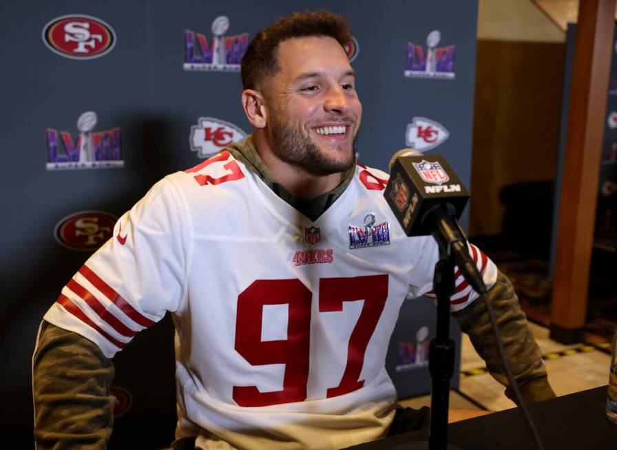 San Francisco 49ers defensive lineman Nick Bosa talks with the news media at Hilton Lake Las Ve ...