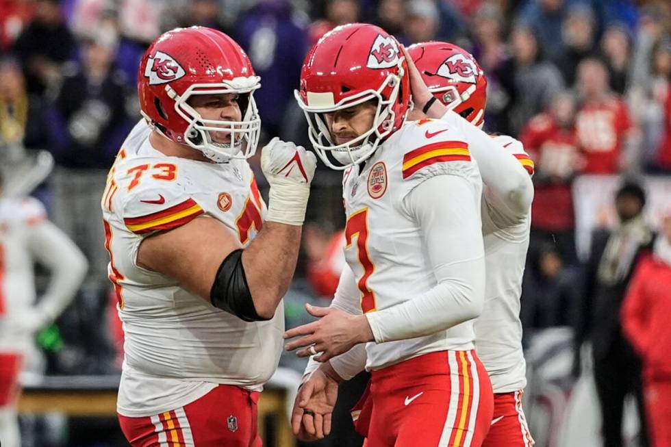 Kansas City Chiefs place kicker Harrison Butker (7) celebrates his field goal against the Balti ...