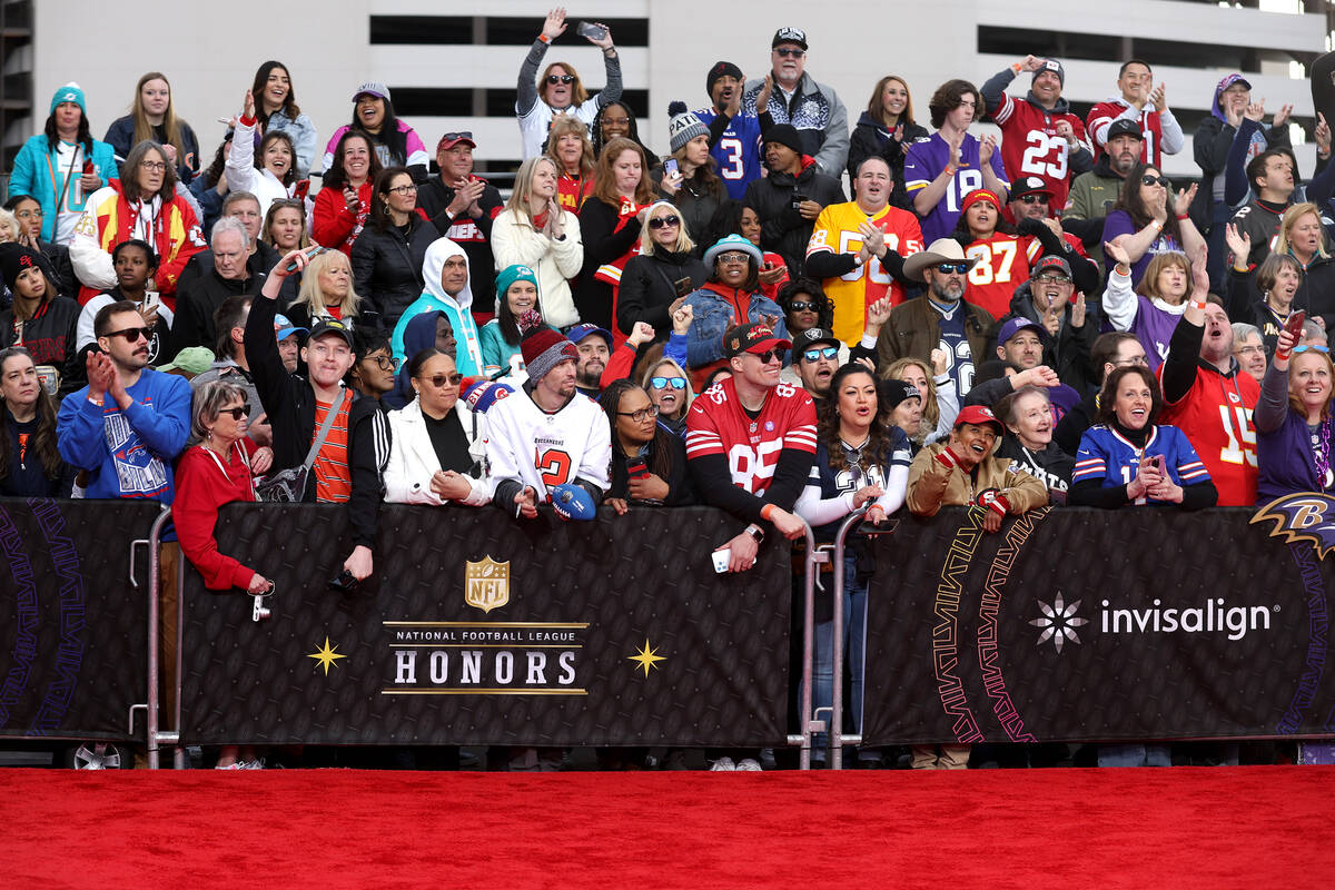Fans line the red carpet before the annual NFL Honors awards show at Resorts World on Thursday, ...