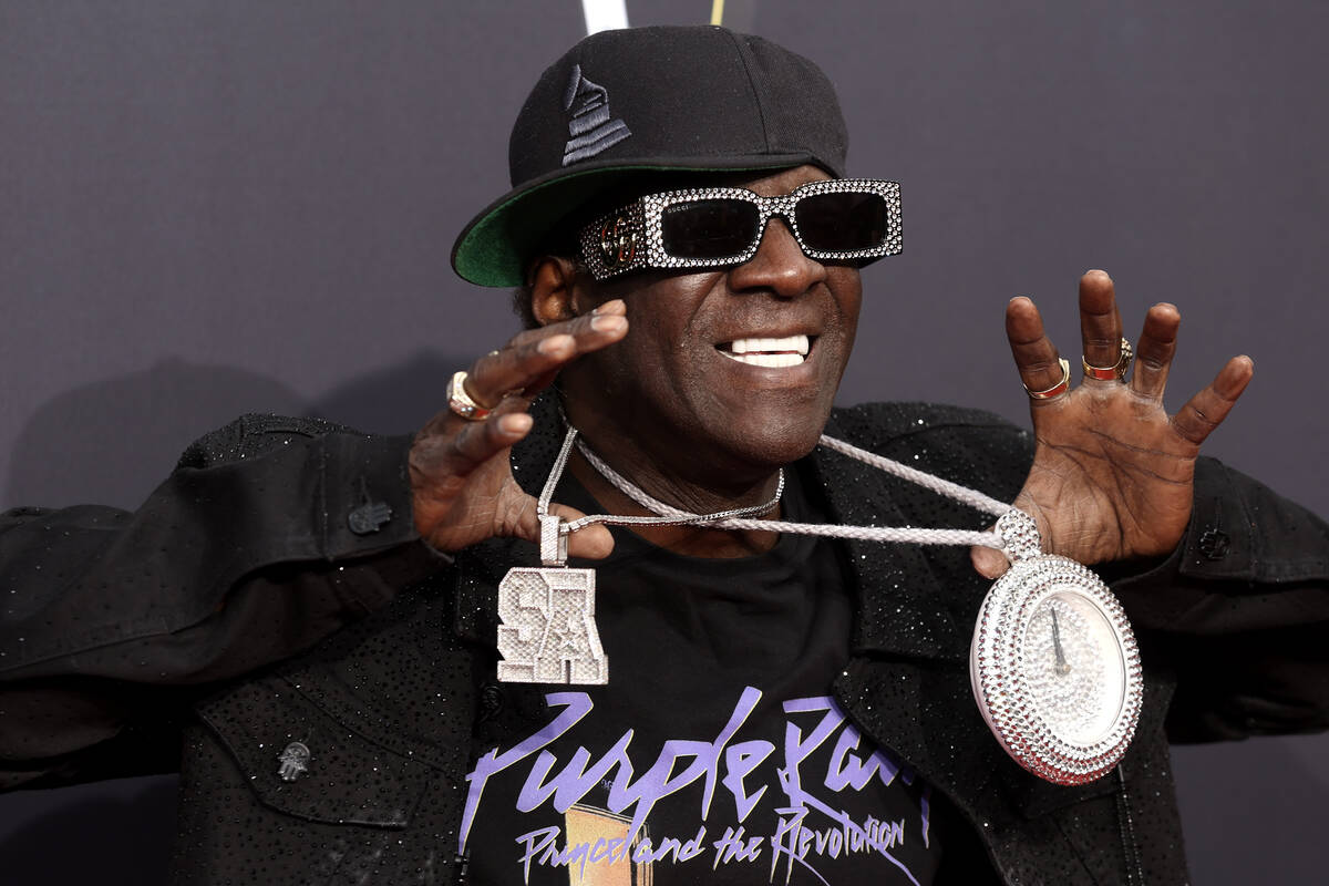 Flavor Flav shows off his bling on the red carpet before the annual NFL Honors awards show at R ...