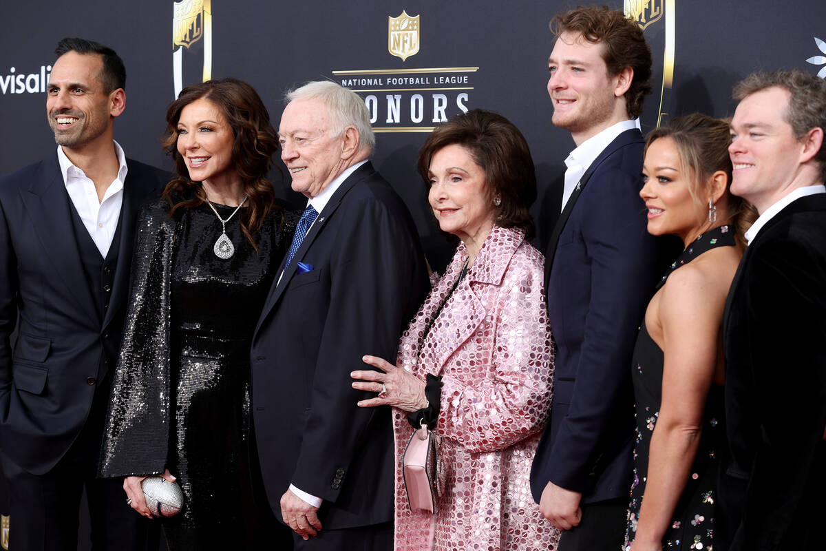 Jerral Wayne Jones Sr., third from left, owner of the Dallas Cowboys, poses on the red carpet w ...