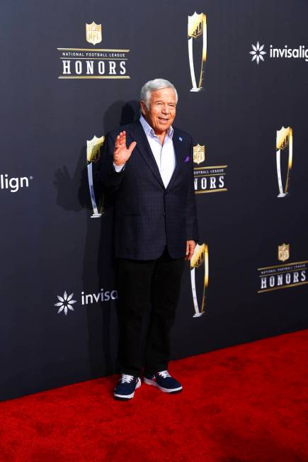 Robert Kraft, CEO of the New England Patriots, walks on the red carpet before the annual NFL Ho ...