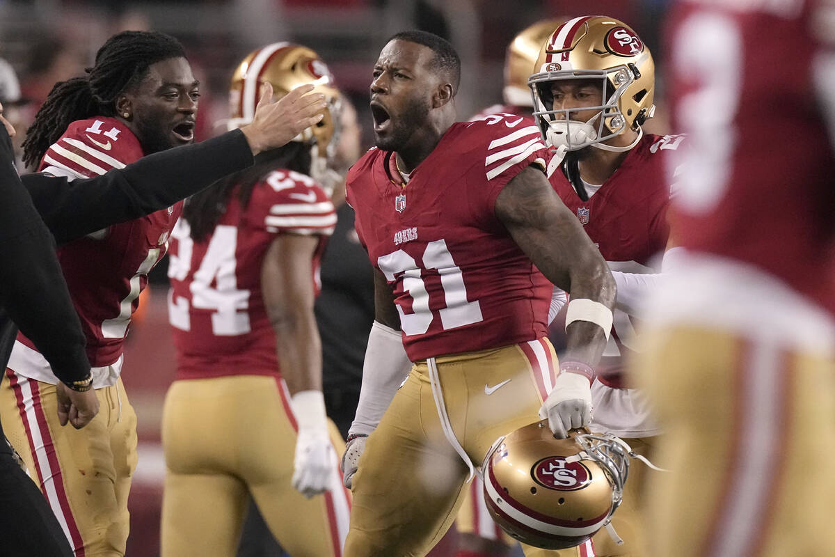 San Francisco 49ers wide receiver Brandon Aiyuk, left, and safety Tashaun Gipson Sr. (31) celeb ...