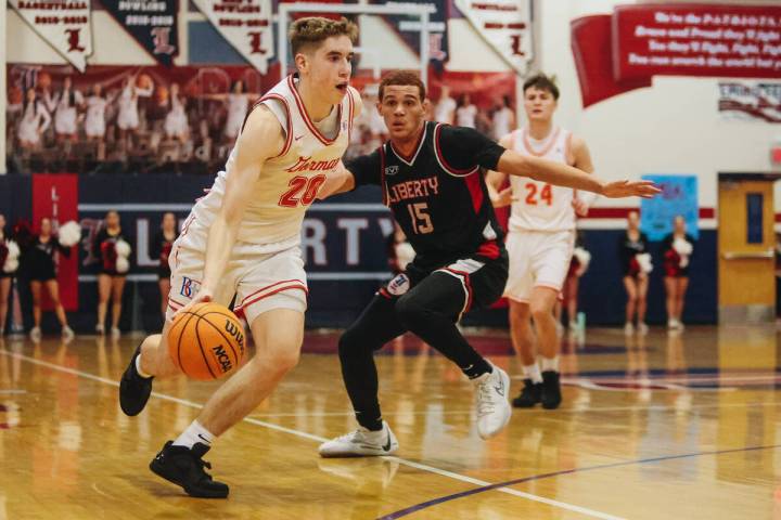 Bishop Gorman’s Ilan Nikolov (20) dribbles the ball during a game between Bishop Gorman ...