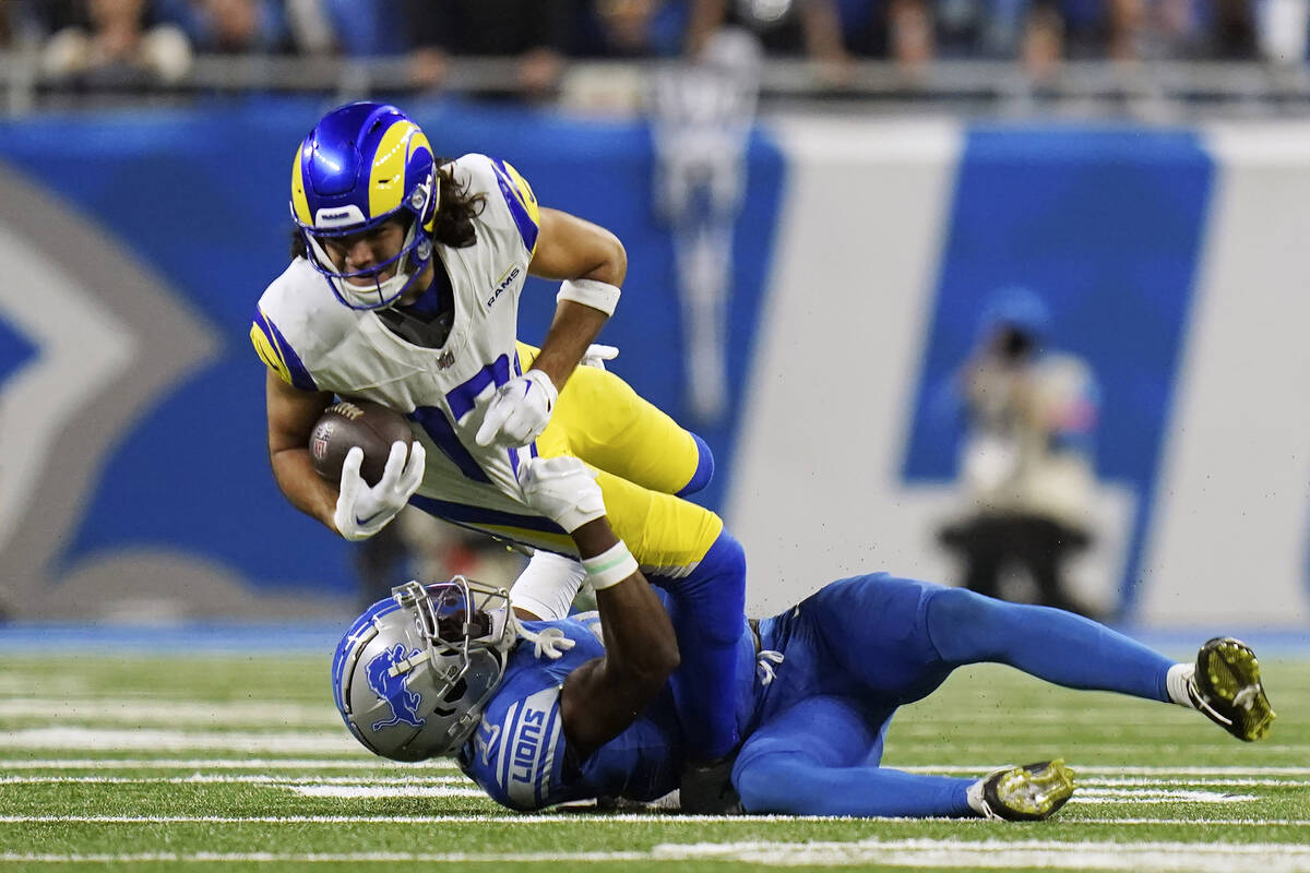 Los Angeles Rams wide receiver Puka Nacua (17) gets tackled by Detroit Lions safety Kerby Josep ...