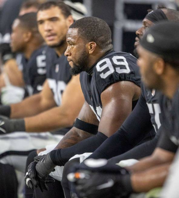 Raiders defensive end Clelin Ferrell (99) looks on from the sideline during the second half of ...